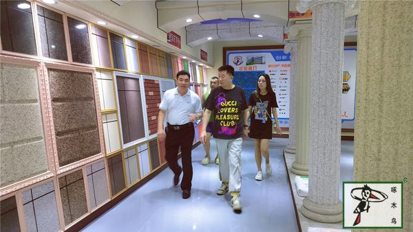 啄木鸟漆业集团 水包水 水包砂 保涂料  涂料品牌   真石漆